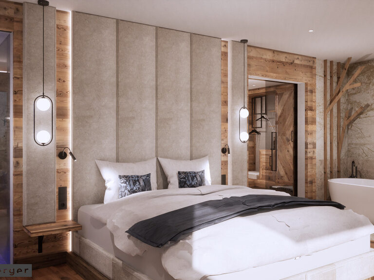 Der Schlafensbereich der Wellness-Suite ALMSINFONIE mit einladendem Bett und moderner Einrichtung im Tonihof.